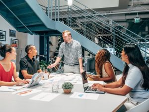 people having a meeting at an office